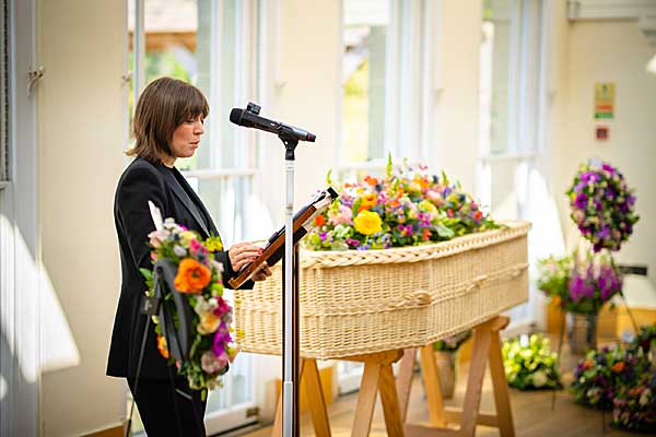 Celebrant leading personalised funeral service