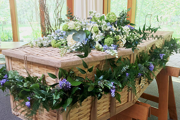 Flower gardland on bamboo coffin